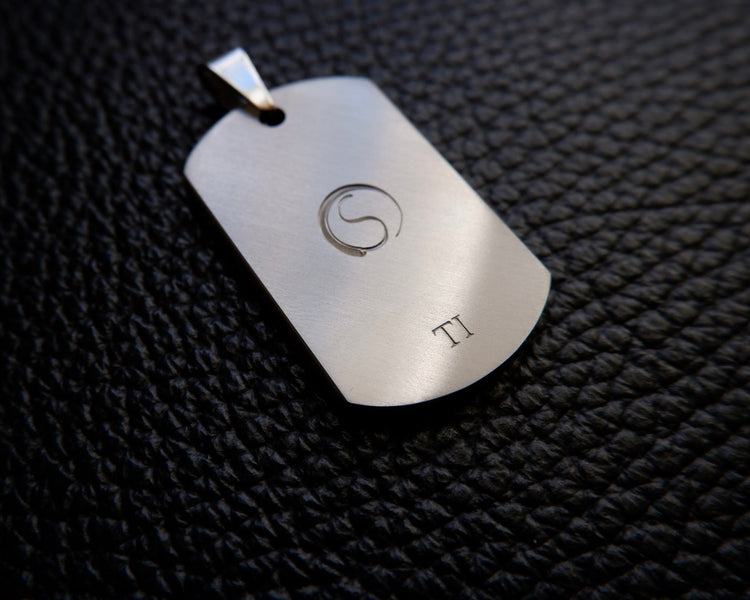 “Silver Mushroom” Hand engraved titanium pendant