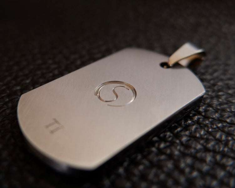 “Silver Mushroom” Hand engraved titanium pendant