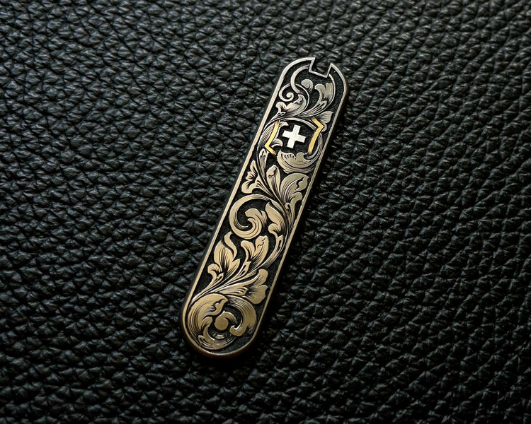 Victorinox hand engraved custom scales with gold and silver inlay 
