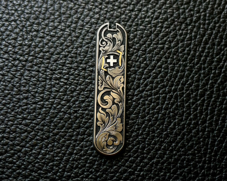 58 mm Victorinox custom hand engraved titanium scales with silver and 24k gold inlay